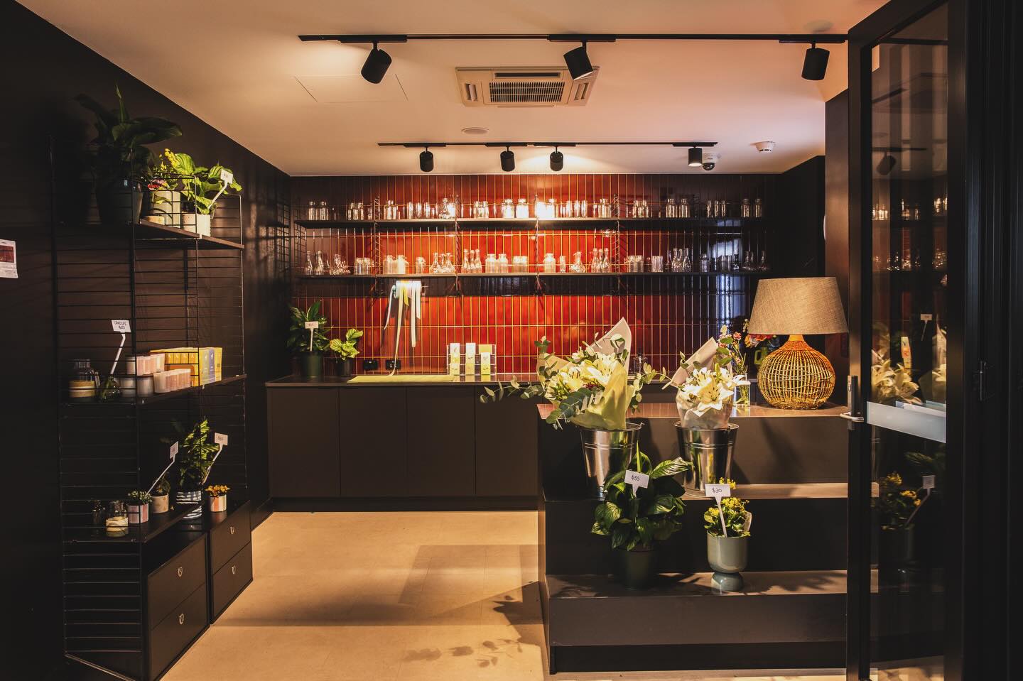 Riri's drinks and food menus on a timber table